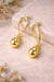 Gold curve drops earrings