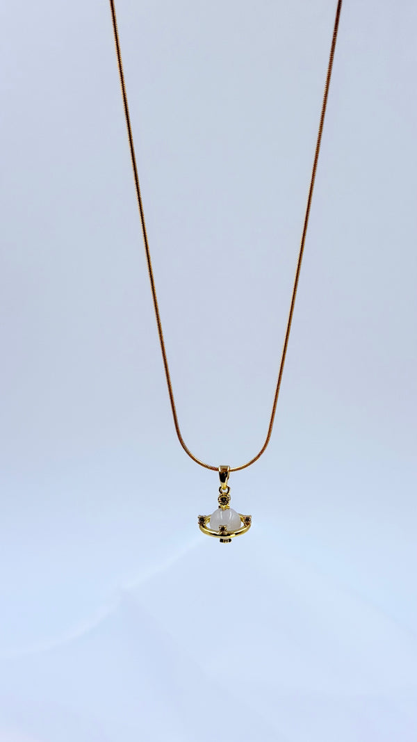 Golden orbit pendant